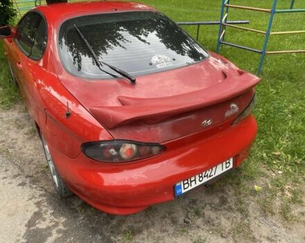 Красный Хендай Тибурон, объемом двигателя 2 л и пробегом 98 тыс. км за 3622 $, фото 3 на Automoto.ua