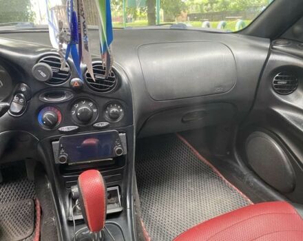 Красный Хендай Тибурон, объемом двигателя 2 л и пробегом 98 тыс. км за 3622 $, фото 7 на Automoto.ua