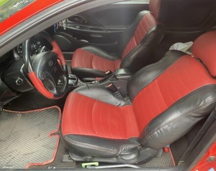 Красный Хендай Тибурон, объемом двигателя 2 л и пробегом 98 тыс. км за 3622 $, фото 5 на Automoto.ua