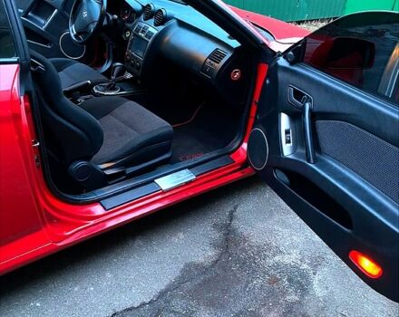 Красный Хендай Тибурон, объемом двигателя 2 л и пробегом 200 тыс. км за 5500 $, фото 11 на Automoto.ua