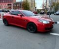 Красный Хендай Тибурон, объемом двигателя 2 л и пробегом 240 тыс. км за 5800 $, фото 1 на Automoto.ua
