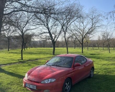 Красный Хендай Тибурон, объемом двигателя 2 л и пробегом 200 тыс. км за 2700 $, фото 2 на Automoto.ua