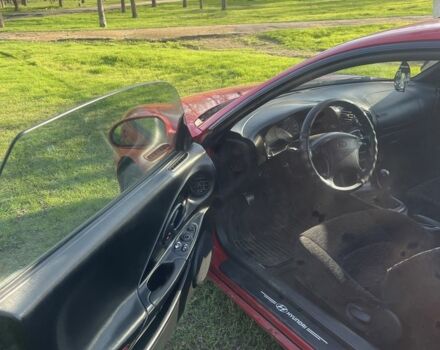 Красный Хендай Тибурон, объемом двигателя 2 л и пробегом 200 тыс. км за 2700 $, фото 4 на Automoto.ua