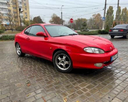 Красный Хендай Тибурон, объемом двигателя 2 л и пробегом 200 тыс. км за 2999 $, фото 7 на Automoto.ua