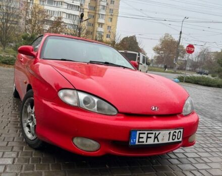 Красный Хендай Тибурон, объемом двигателя 2 л и пробегом 200 тыс. км за 2999 $, фото 9 на Automoto.ua