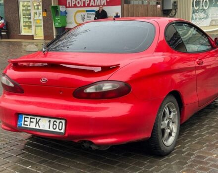 Красный Хендай Тибурон, объемом двигателя 2 л и пробегом 200 тыс. км за 2999 $, фото 6 на Automoto.ua