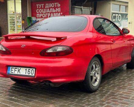 Красный Хендай Тибурон, объемом двигателя 2 л и пробегом 200 тыс. км за 2999 $, фото 3 на Automoto.ua