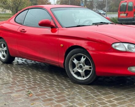 Красный Хендай Тибурон, объемом двигателя 2 л и пробегом 200 тыс. км за 2999 $, фото 2 на Automoto.ua