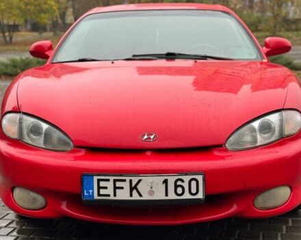 Красный Хендай Тибурон, объемом двигателя 2 л и пробегом 200 тыс. км за 2999 $, фото 1 на Automoto.ua