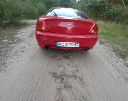 Червоний Хендай Тібурон, об'ємом двигуна 2 л та пробігом 300 тис. км за 3300 $, фото 2 на Automoto.ua