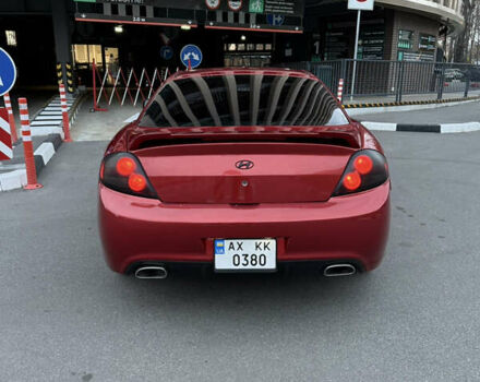 Красный Хендай Тибурон, объемом двигателя 1.98 л и пробегом 240 тыс. км за 5800 $, фото 1 на Automoto.ua