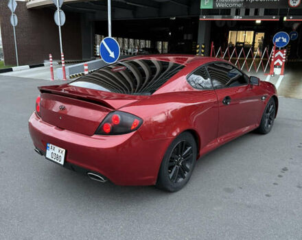 Красный Хендай Тибурон, объемом двигателя 1.98 л и пробегом 240 тыс. км за 5800 $, фото 2 на Automoto.ua