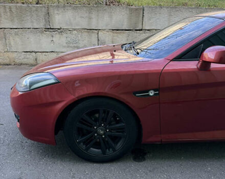 Красный Хендай Тибурон, объемом двигателя 1.98 л и пробегом 240 тыс. км за 5800 $, фото 14 на Automoto.ua