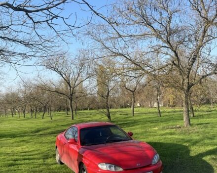 Червоний Хендай Тібурон, об'ємом двигуна 2 л та пробігом 200 тис. км за 2700 $, фото 1 на Automoto.ua