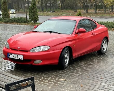 Красный Хендай Тибурон, объемом двигателя 2 л и пробегом 200 тыс. км за 2999 $, фото 1 на Automoto.ua