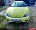 Желтый Хендай Тибурон, объемом двигателя 2 л и пробегом 260 тыс. км за 2000 $, фото 1 на Automoto.ua