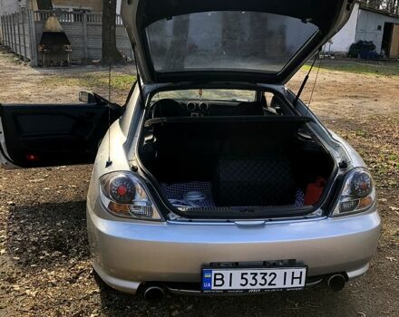 Серый Хендай Тибурон, объемом двигателя 2 л и пробегом 190 тыс. км за 4200 $, фото 12 на Automoto.ua