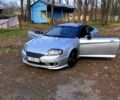 Серый Хендай Тибурон, объемом двигателя 2 л и пробегом 190 тыс. км за 4200 $, фото 1 на Automoto.ua