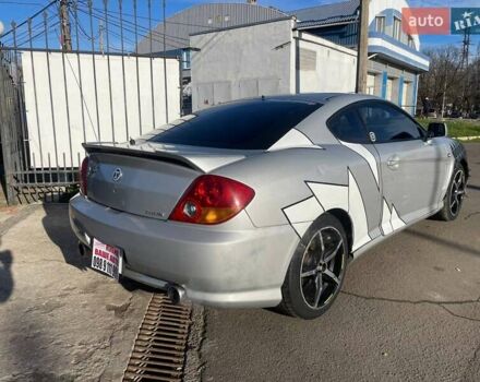 Серый Хендай Тибурон, объемом двигателя 2.66 л и пробегом 161 тыс. км за 5099 $, фото 6 на Automoto.ua