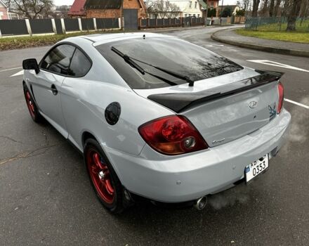 Серый Хендай Тибурон, объемом двигателя 2 л и пробегом 168 тыс. км за 4600 $, фото 5 на Automoto.ua