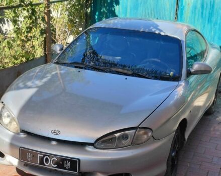 Серый Хендай Тибурон, объемом двигателя 2 л и пробегом 250 тыс. км за 2500 $, фото 1 на Automoto.ua