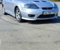 Сірий Хендай Тібурон, об'ємом двигуна 2 л та пробігом 208 тис. км за 4300 $, фото 1 на Automoto.ua