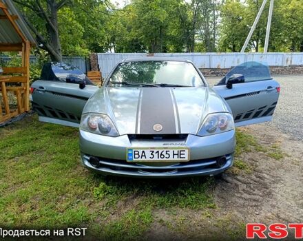 Серый Хендай Тибурон, объемом двигателя 2 л и пробегом 200 тыс. км за 3500 $, фото 1 на Automoto.ua