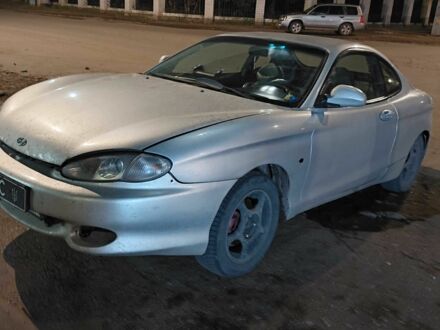 Серый Хендай Тибурон, объемом двигателя 2 л и пробегом 250 тыс. км за 2500 $, фото 1 на Automoto.ua