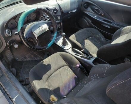 Синий Хендай Тибурон, объемом двигателя 1.6 л и пробегом 232 тыс. км за 650 $, фото 4 на Automoto.ua