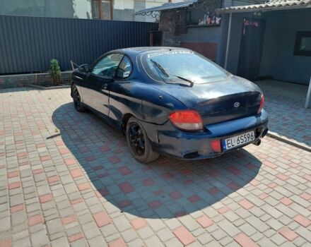 Синий Хендай Тибурон, объемом двигателя 1.6 л и пробегом 232 тыс. км за 650 $, фото 2 на Automoto.ua