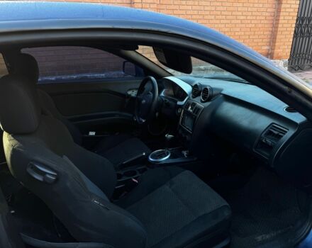 Синий Хендай Тибурон, объемом двигателя 2 л и пробегом 178 тыс. км за 2800 $, фото 5 на Automoto.ua