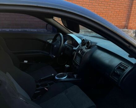 Синий Хендай Тибурон, объемом двигателя 2 л и пробегом 178 тыс. км за 2800 $, фото 4 на Automoto.ua