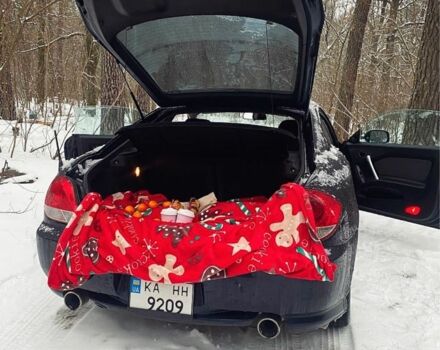 Синий Хендай Тибурон, объемом двигателя 2 л и пробегом 165 тыс. км за 6395 $, фото 4 на Automoto.ua