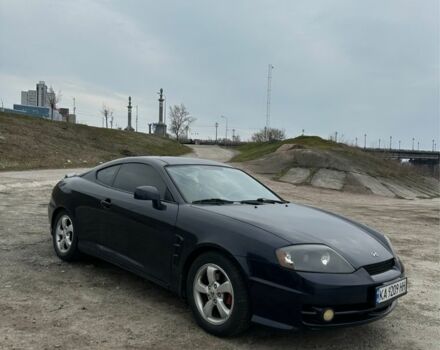 Синий Хендай Тибурон, объемом двигателя 2 л и пробегом 165 тыс. км за 6395 $, фото 5 на Automoto.ua