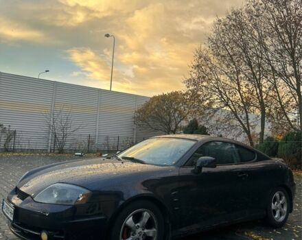 Синий Хендай Тибурон, объемом двигателя 2 л и пробегом 165 тыс. км за 6395 $, фото 1 на Automoto.ua