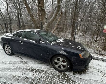 Синий Хендай Тибурон, объемом двигателя 2 л и пробегом 165 тыс. км за 6395 $, фото 3 на Automoto.ua