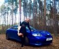 Синий Хендай Тибурон, объемом двигателя 2 л и пробегом 150 тыс. км за 5700 $, фото 1 на Automoto.ua