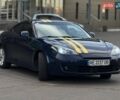 Синий Хендай Тибурон, объемом двигателя 2 л и пробегом 188 тыс. км за 5500 $, фото 3 на Automoto.ua