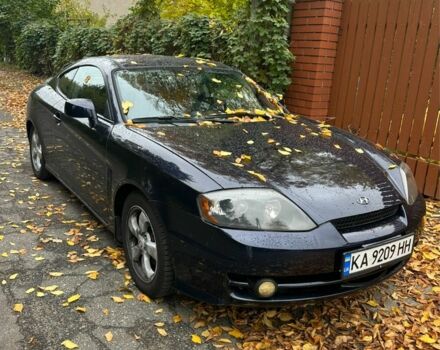 Синій Хендай Тібурон, об'ємом двигуна 2 л та пробігом 165 тис. км за 6395 $, фото 1 на Automoto.ua