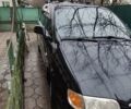 Черный Хендай Траджет, объемом двигателя 2 л и пробегом 297 тыс. км за 4500 $, фото 2 на Automoto.ua