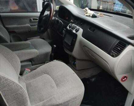 Черный Хендай Траджет, объемом двигателя 2 л и пробегом 297 тыс. км за 4500 $, фото 8 на Automoto.ua