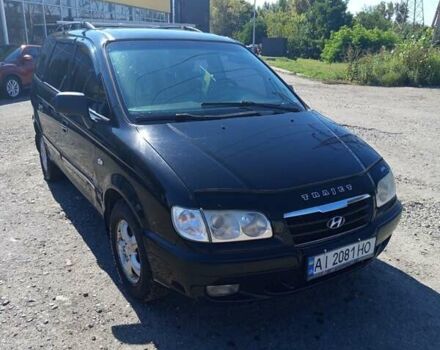 Чорний Хендай Траджет, об'ємом двигуна 2 л та пробігом 350 тис. км за 5400 $, фото 7 на Automoto.ua