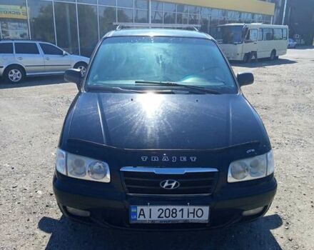 Чорний Хендай Траджет, об'ємом двигуна 2 л та пробігом 350 тис. км за 5400 $, фото 4 на Automoto.ua