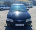 Чорний Хендай Траджет, об'ємом двигуна 2 л та пробігом 350 тис. км за 5400 $, фото 4 на Automoto.ua