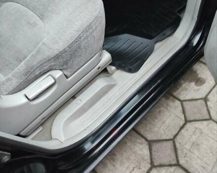 Черный Хендай Траджет, объемом двигателя 2 л и пробегом 297 тыс. км за 4500 $, фото 10 на Automoto.ua