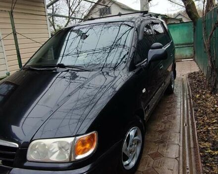 Черный Хендай Траджет, объемом двигателя 2 л и пробегом 297 тыс. км за 4500 $, фото 1 на Automoto.ua