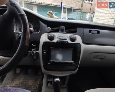 Черный Хендай Траджет, объемом двигателя 2 л и пробегом 297 тыс. км за 4500 $, фото 5 на Automoto.ua