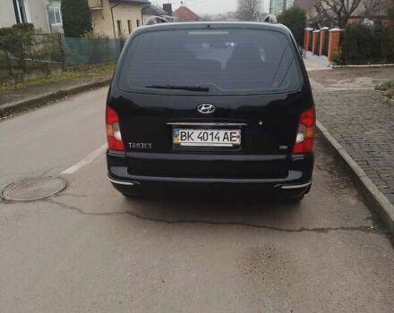 Черный Хендай Траджет, объемом двигателя 1.99 л и пробегом 235 тыс. км за 3999 $, фото 2 на Automoto.ua