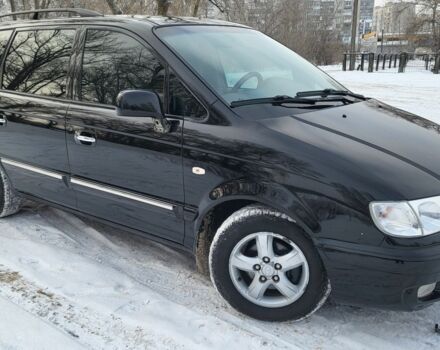 Черный Хендай Траджет, объемом двигателя 2 л и пробегом 200 тыс. км за 4700 $, фото 1 на Automoto.ua