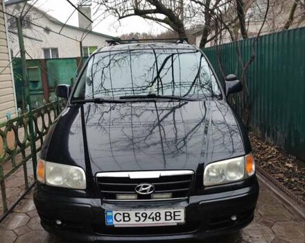 Черный Хендай Траджет, объемом двигателя 2 л и пробегом 297 тыс. км за 4500 $, фото 1 на Automoto.ua